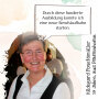 Frau im Dirndl lacht mit Sprechblase